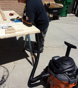 Adrian using my new wet/dry vacuum for dust collection with the Kreg Jig. This worked terrifically, saving tons of clean-up!!!